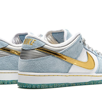SB DUNK LOW "Sean Cliver - Holiday Special"