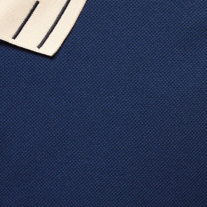 Cotton polo with embroidered collar